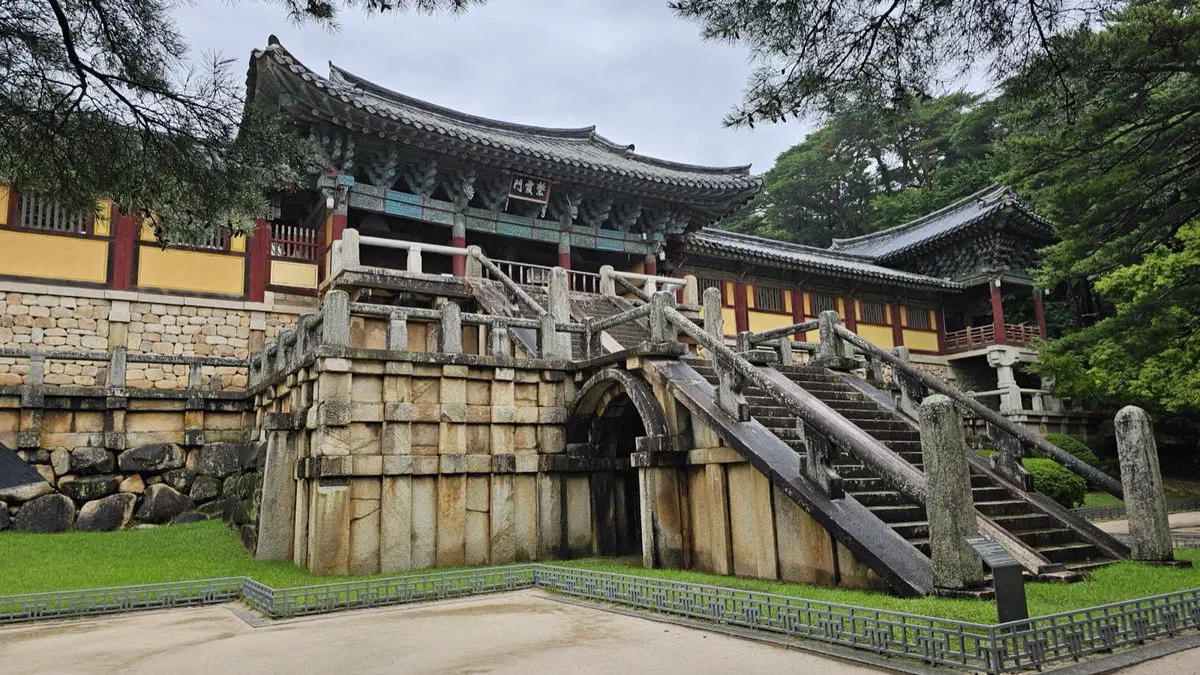 The stone bridge and staircases leading up to Bulguksa's Jahamun gate, a Silla-era stone structure beneath the reconstructed wooden gate above it