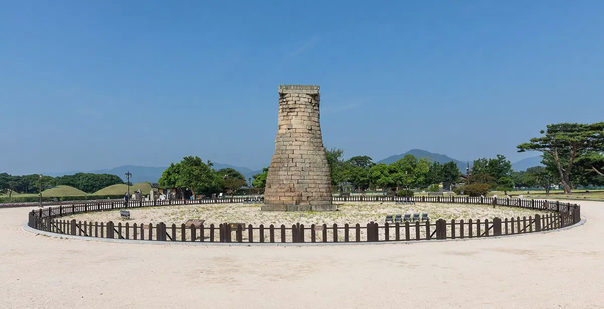Cheomseongdae, a stone astronomical observatory built in the Silla kingdom, under a clear blue sky in Gyeongju