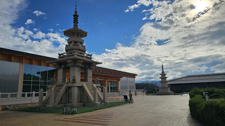 A stone pagoda in front of one of the National Gyeongju Museum's exhibition halls