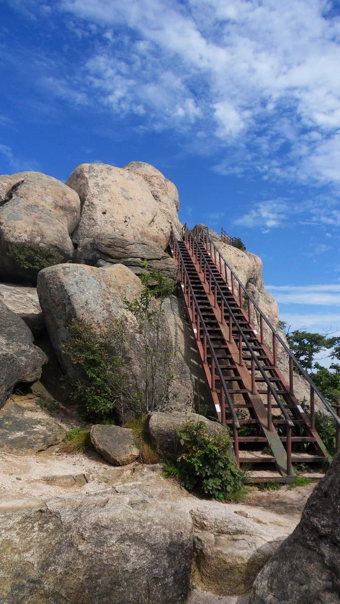 Munjangdae, the large flat boulder summit on Songnisan that draws more hikers than the mountain's actual highest peak