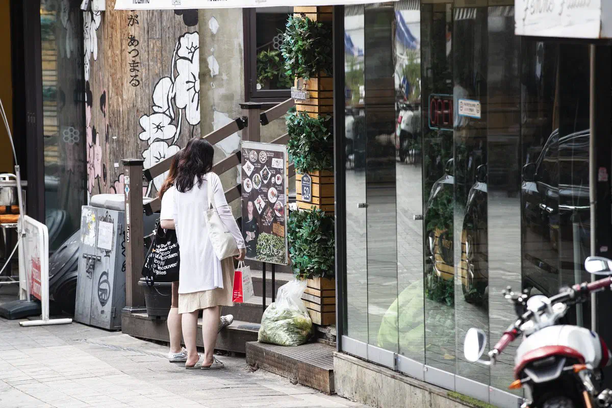 A street in Itaewon, Yongsan-gu, lined with the bars and small shops that gave the Itaewon Class neighborhood its look